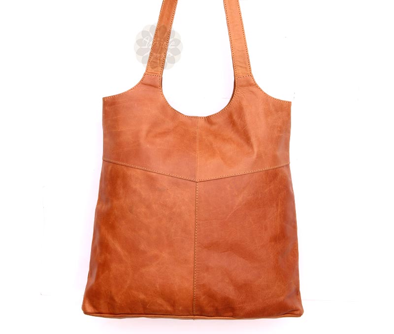 Vogue Crafts & Designs Pvt. Ltd. manufactures Brown Tote Bag at wholesale price.